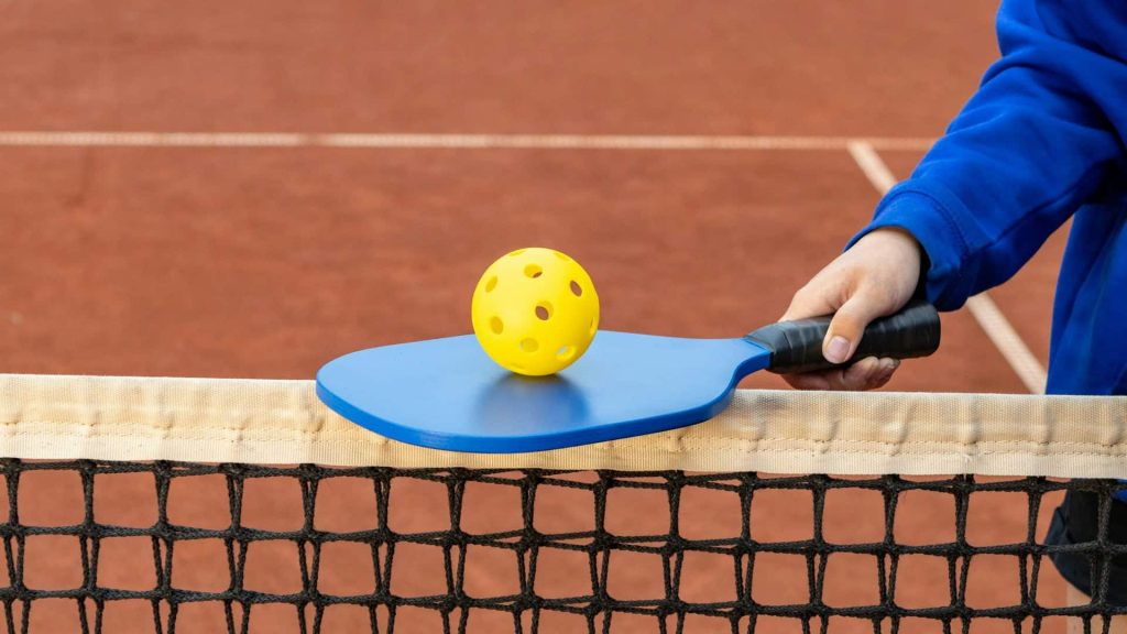 man playing pickleball